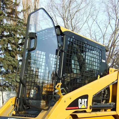 cat skid steer enclosures|caterpillar cabin door enclosure.